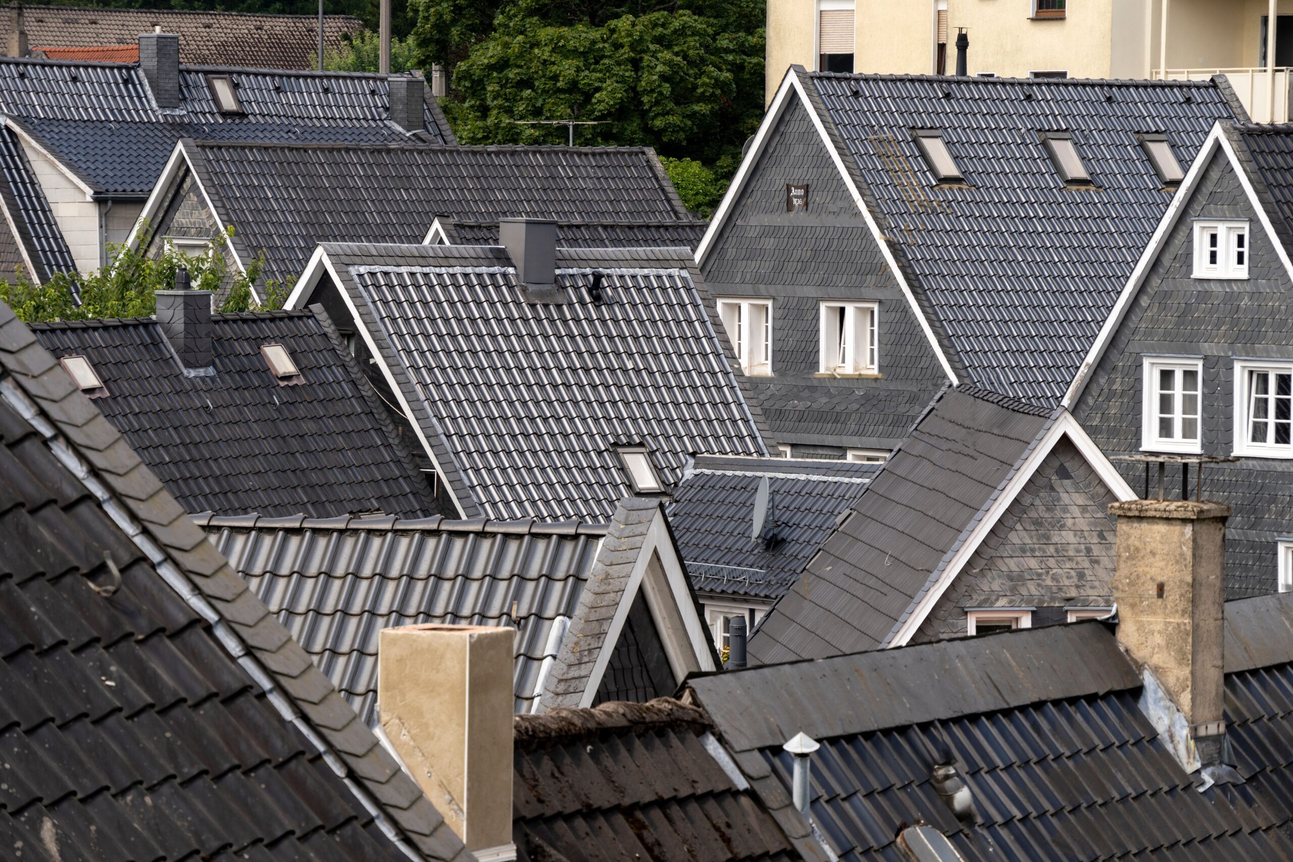 Aerial view of residential roof tiles, the kind of angle covered by a roof survey cost